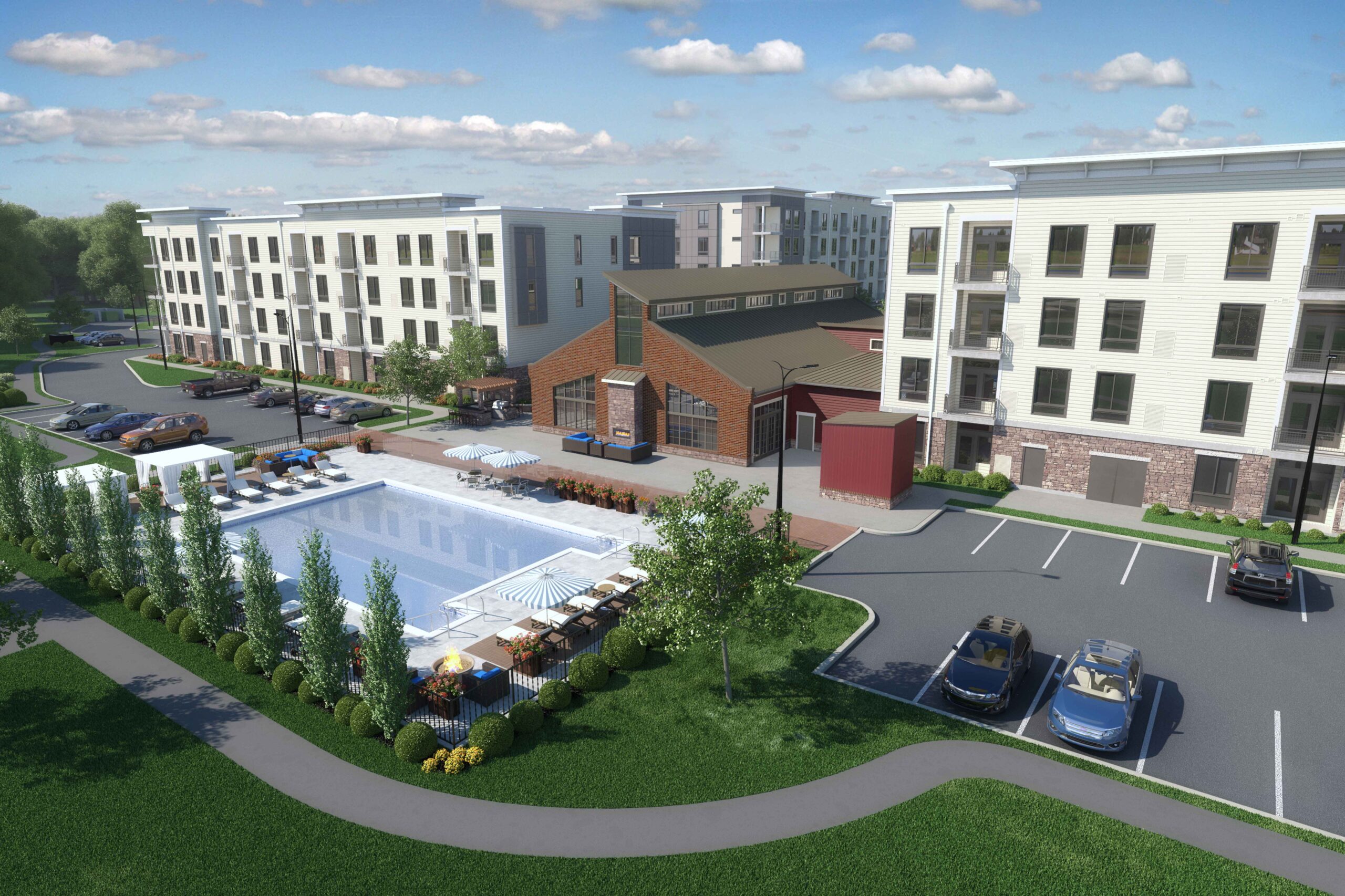 Pool, lounge area, parking and apartments in the background at Terrapin Row