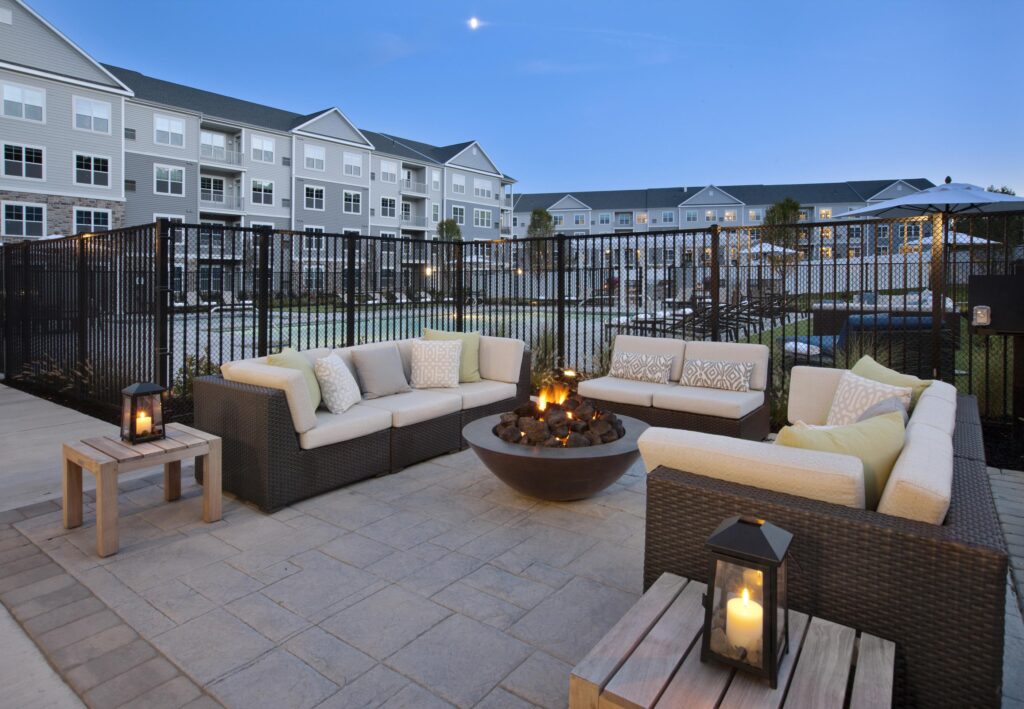 Firepit and outdoor seating at Parc Westborough at dusk