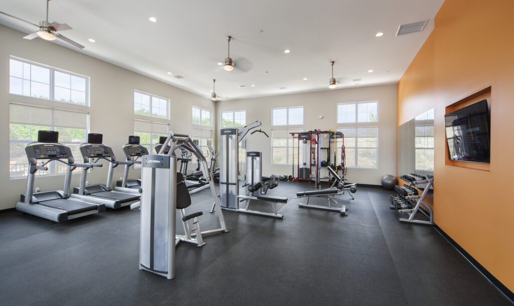 Parc Plymouth Meeting's fitness center with cardio machines and weight lifting equipment