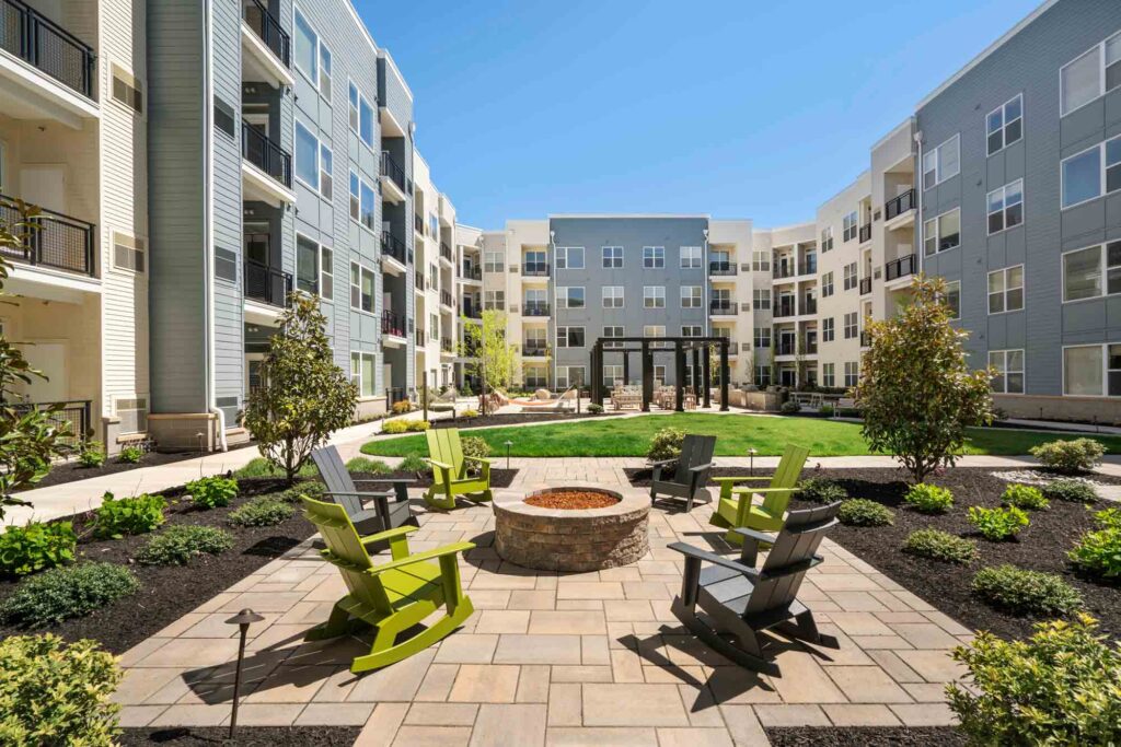 Chairs around firepit at Kensington Place