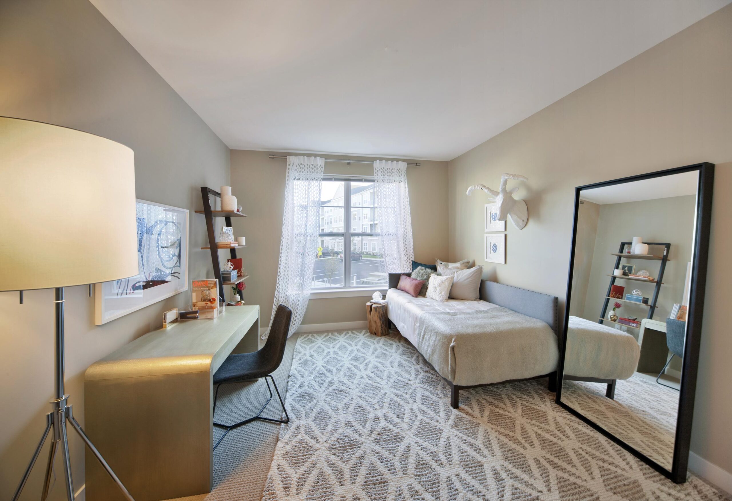 Bedroom at Parc Westborough with daybed, desk, chair and full length mirror