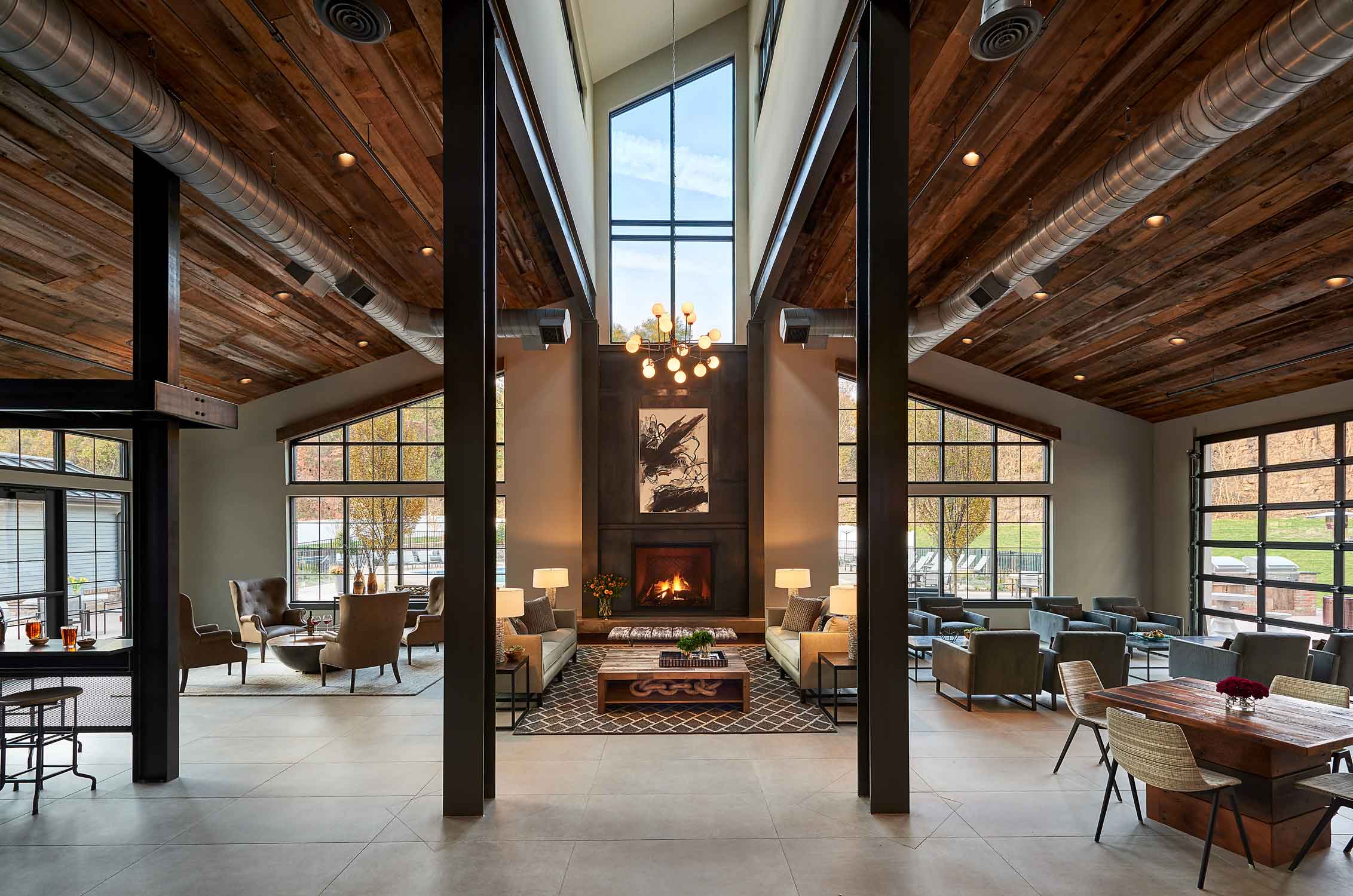 Fireplace and seating areas in clubhouse at Riverworks
