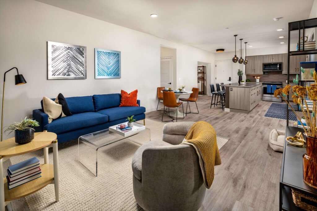 Living area with dining area and kitchen in background at Cameo