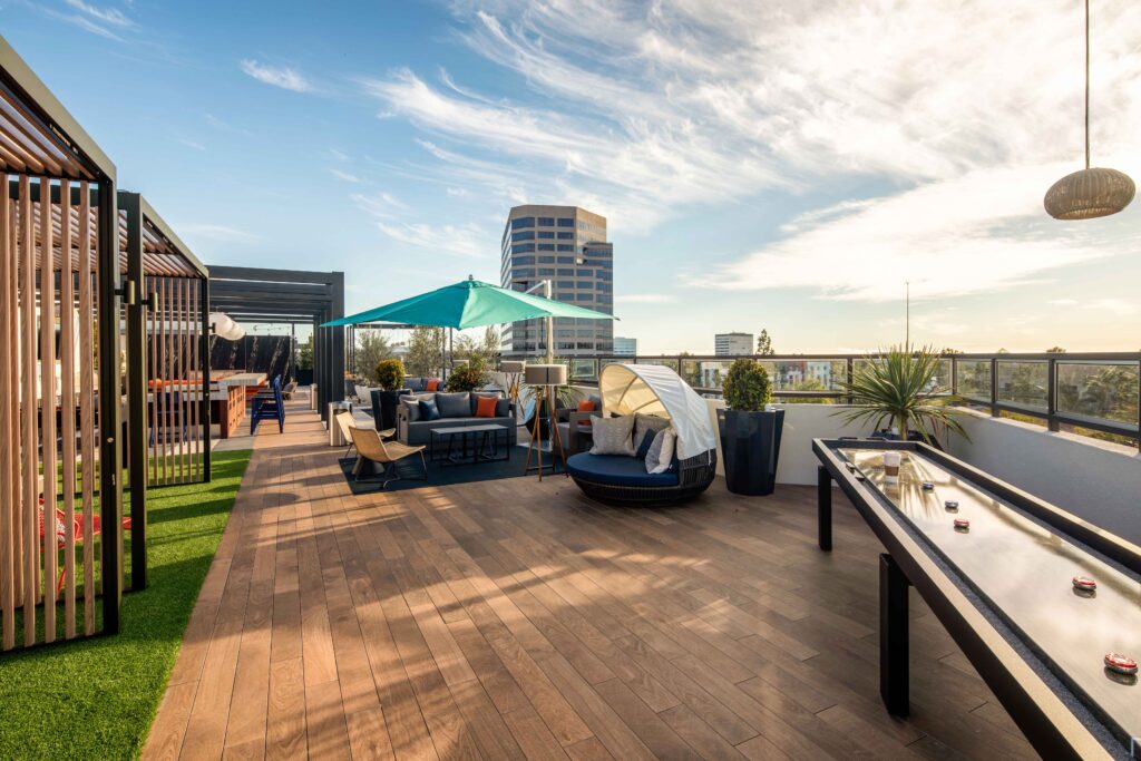 Seating areas and shuffleboard table at sky lounge at Cameo