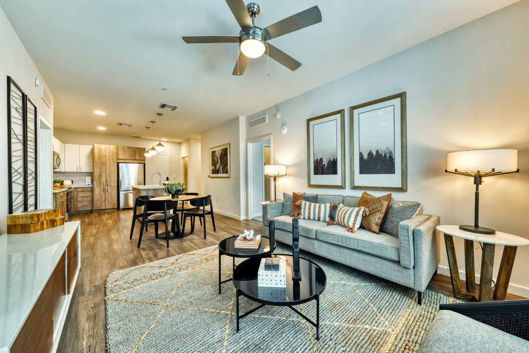 Model living and dining area at Haverly