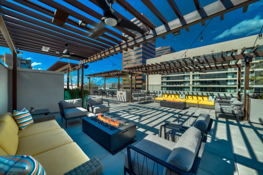 Rooftop lounge with firepits at Haverly