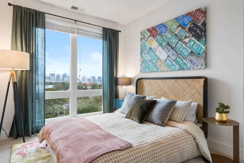 Model bedroom with big windows at Osprey