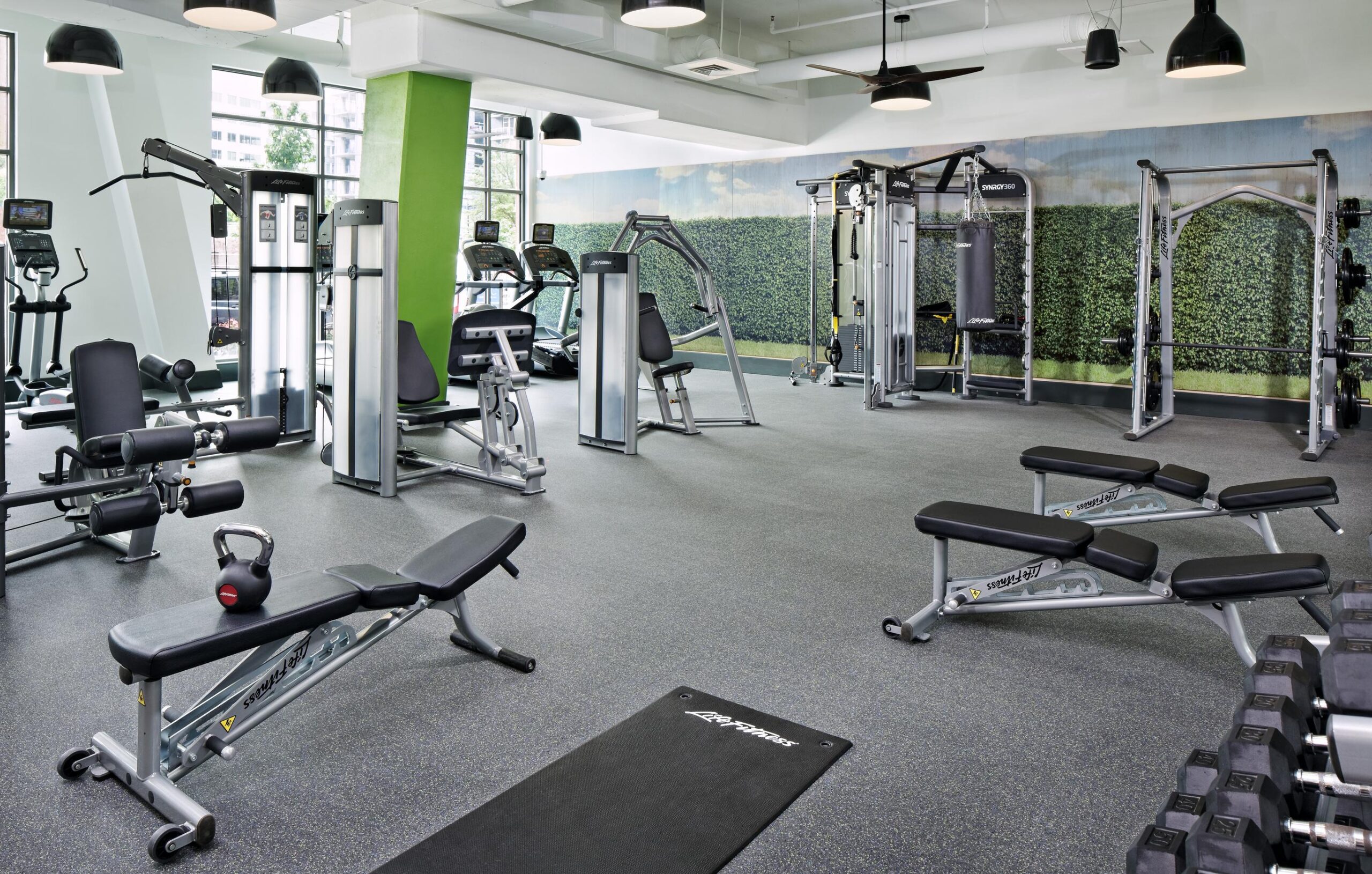 Fitness center at Parc Riverside with cardio and weight equipment