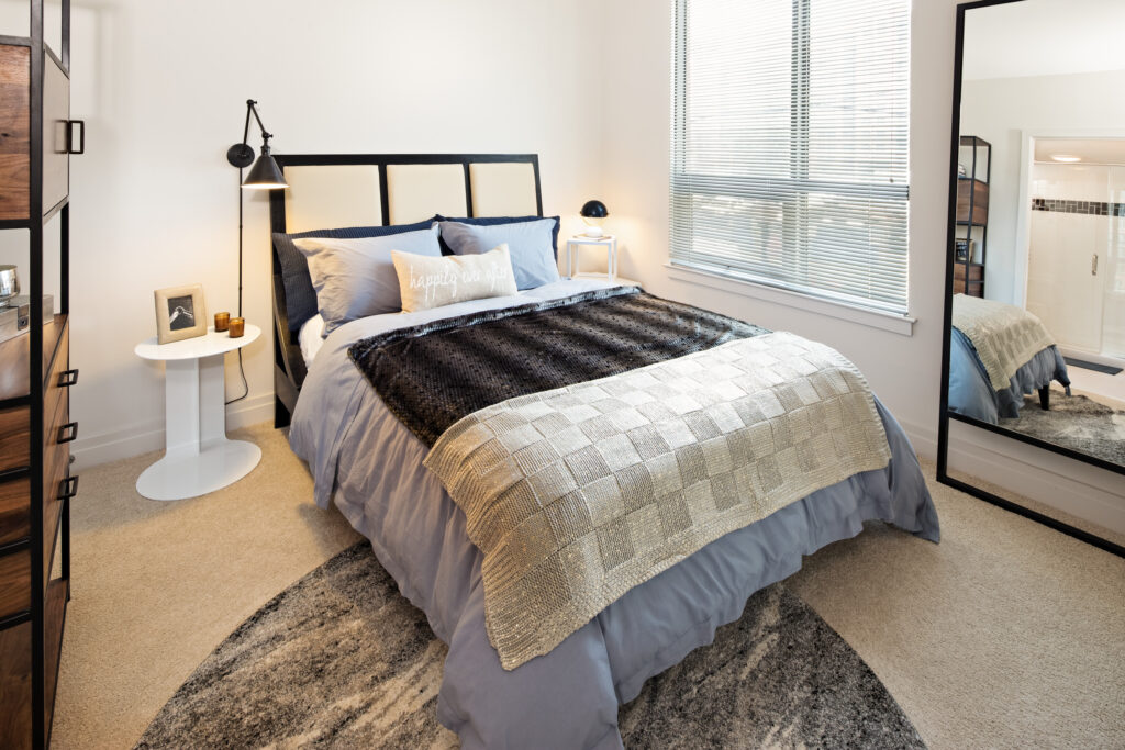 Model bedroom at Parc Riverside with plush carpeting