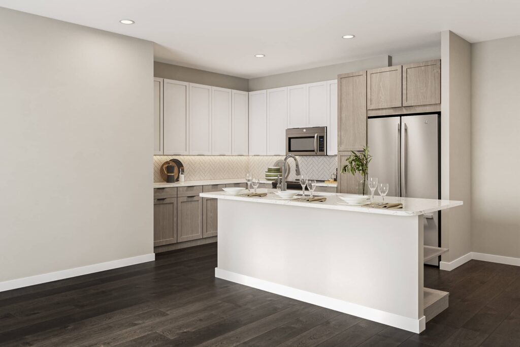 View of modern kitchen with stainless steel appliances and island at The Settler