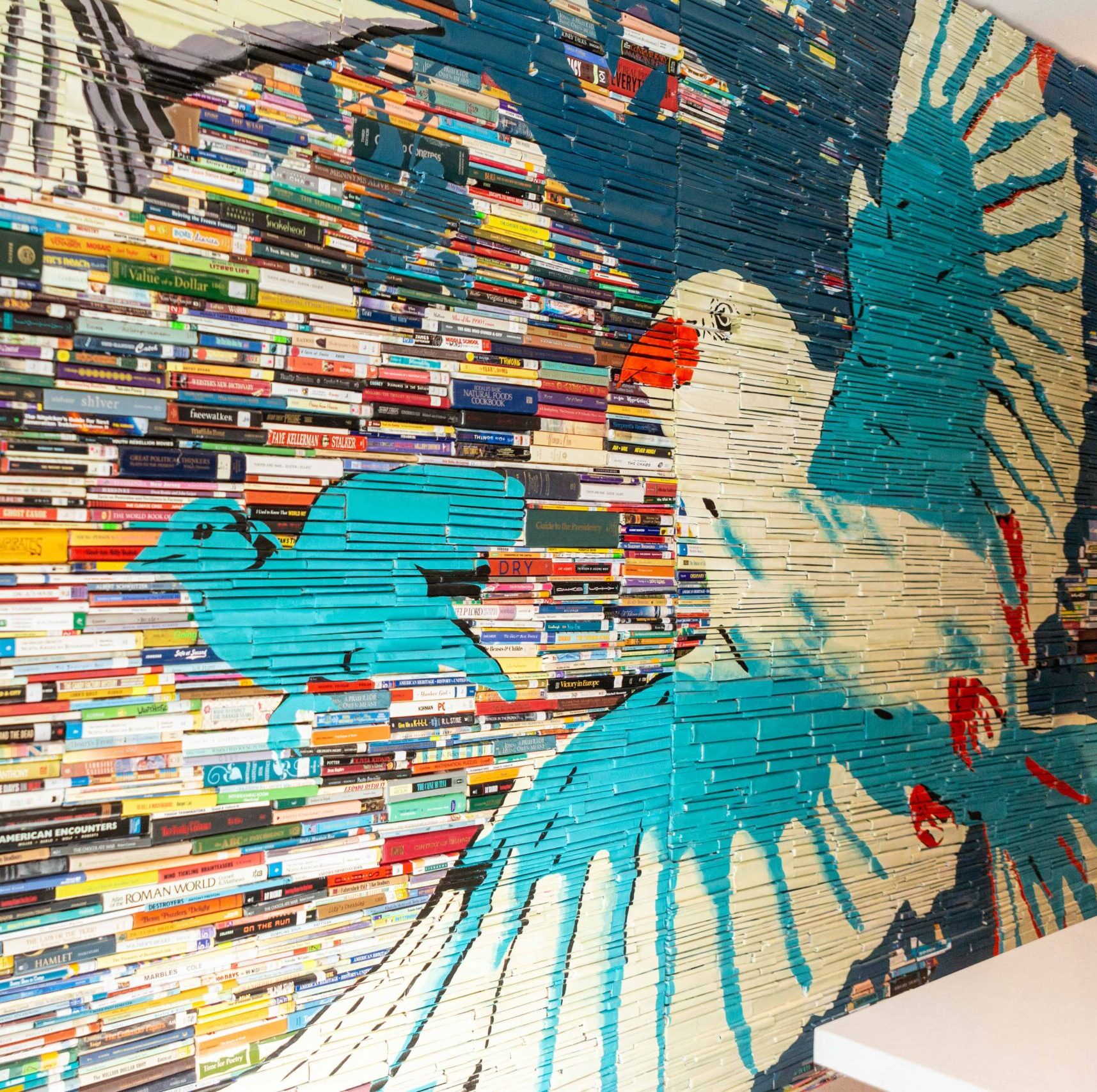 Mural artwork on a wall featuring birds