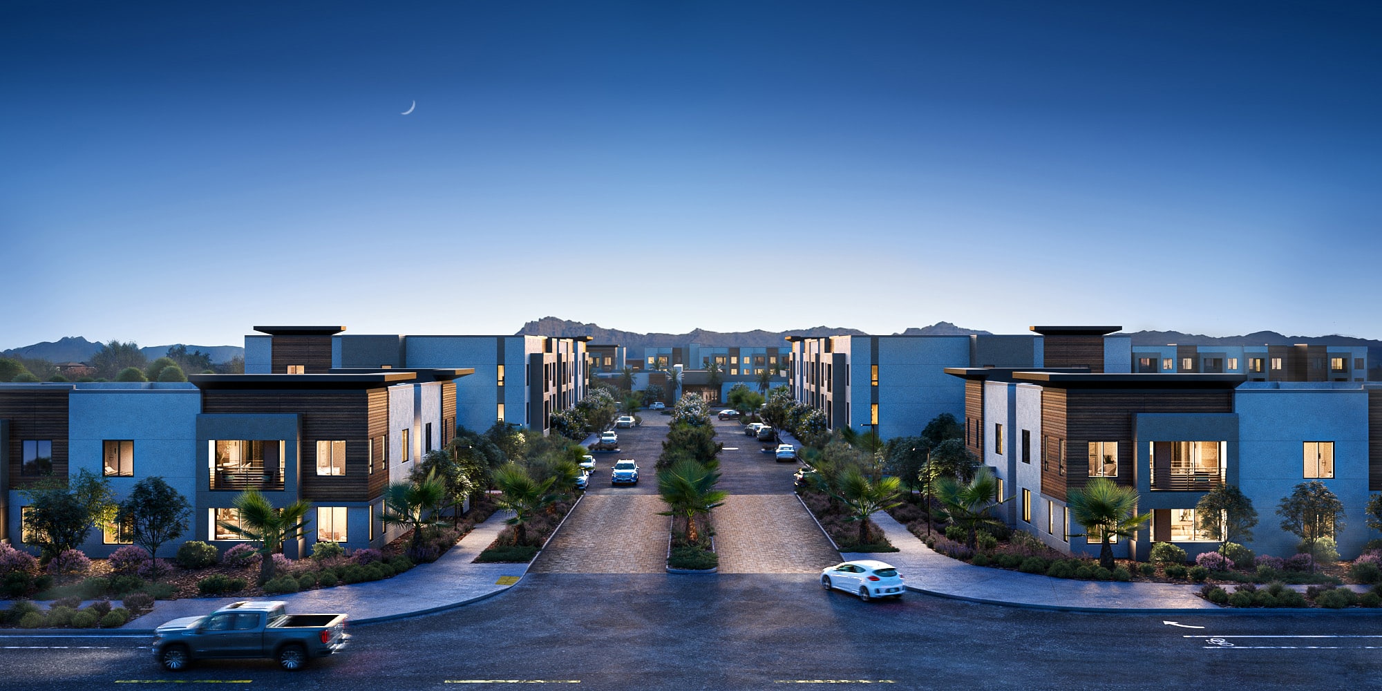 An exterior rendering of the Navona apartment community at dusk with mountains in the background